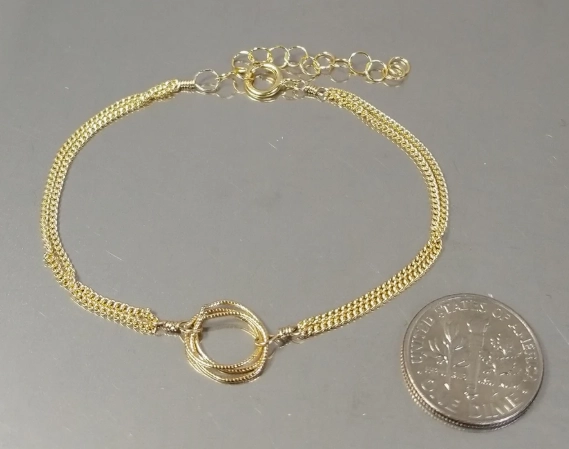 Trinity bracelet on a chain