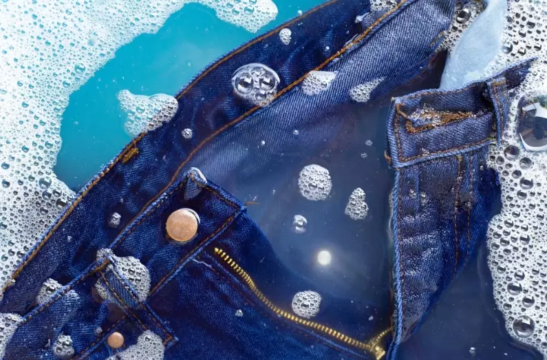 do jeans shrink or expand after washing