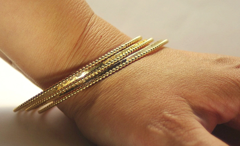 stacking gold bracelets