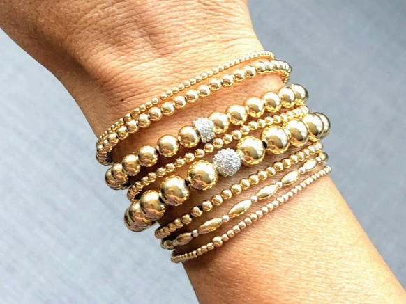 how to layer gold bracelets
