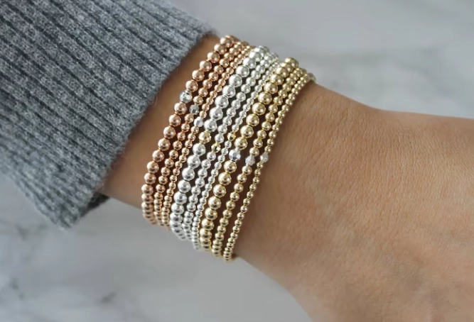stacking gold bracelets