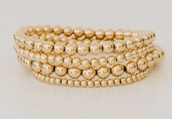 how to layer gold bracelets