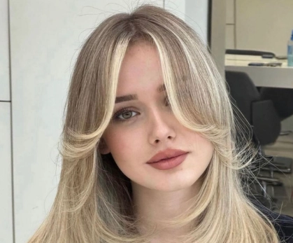 long layers with curtain bangs wavy hair