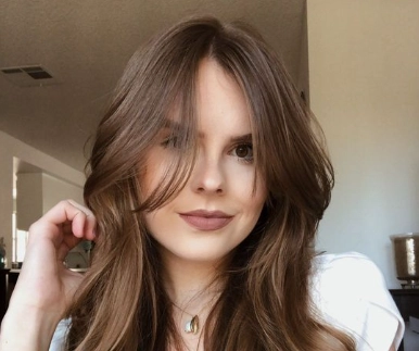 long hair with curtain bangs and fringe