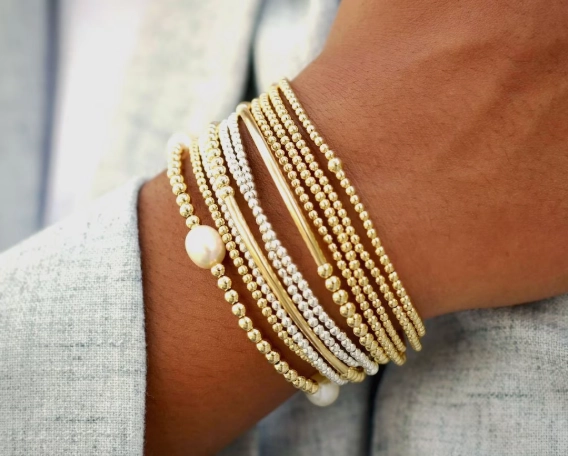 how to stack gold bracelets