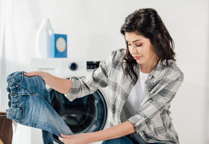 do jeans shrink in dryer