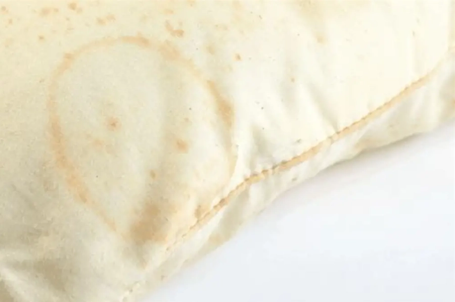 wash feather pillows at home